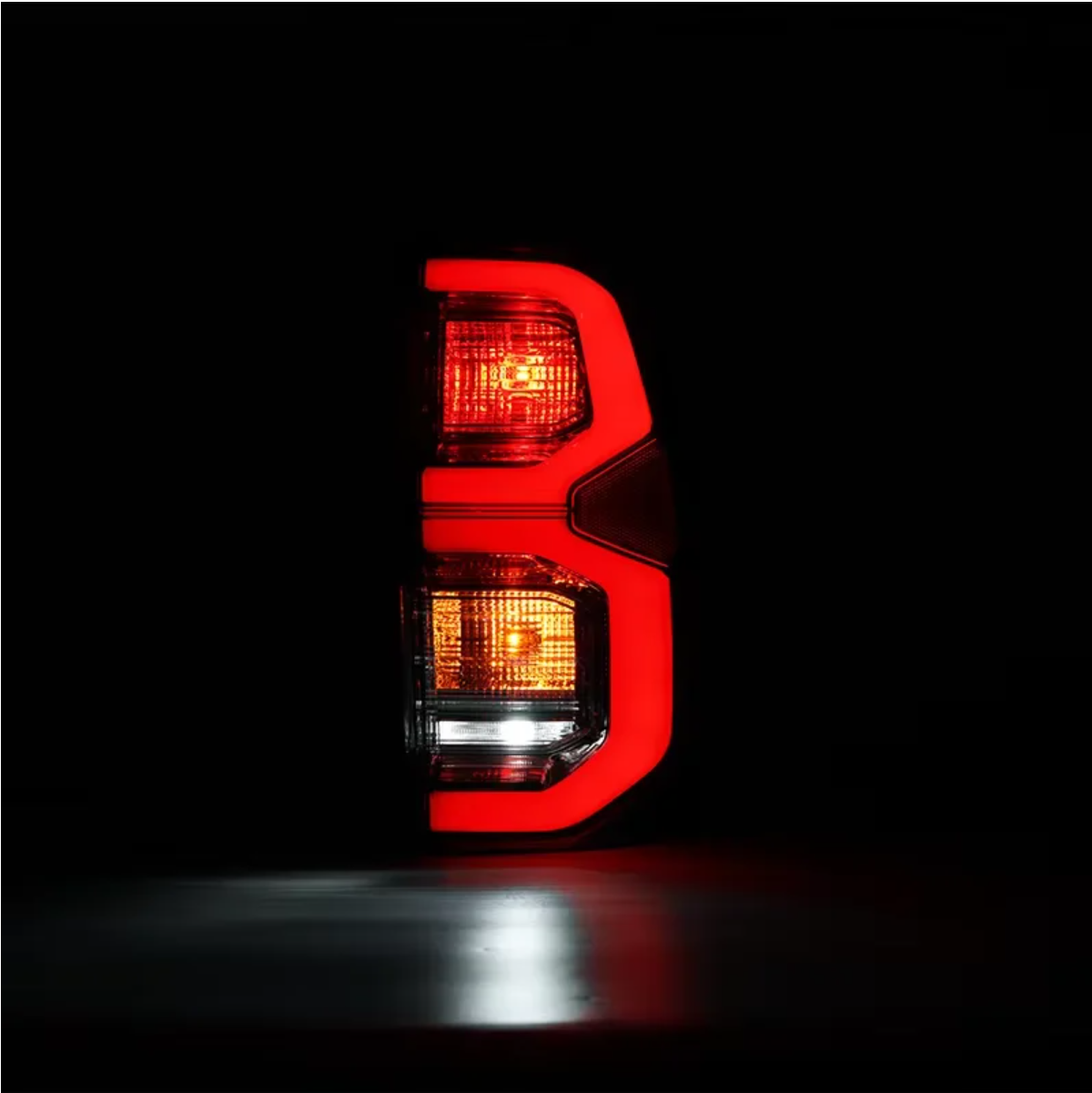Smoked Tail Light Pair – To Fit Toyota Hilux 2015–2025 – LED Style Rear Lamps with Wiring Looms - Partzo