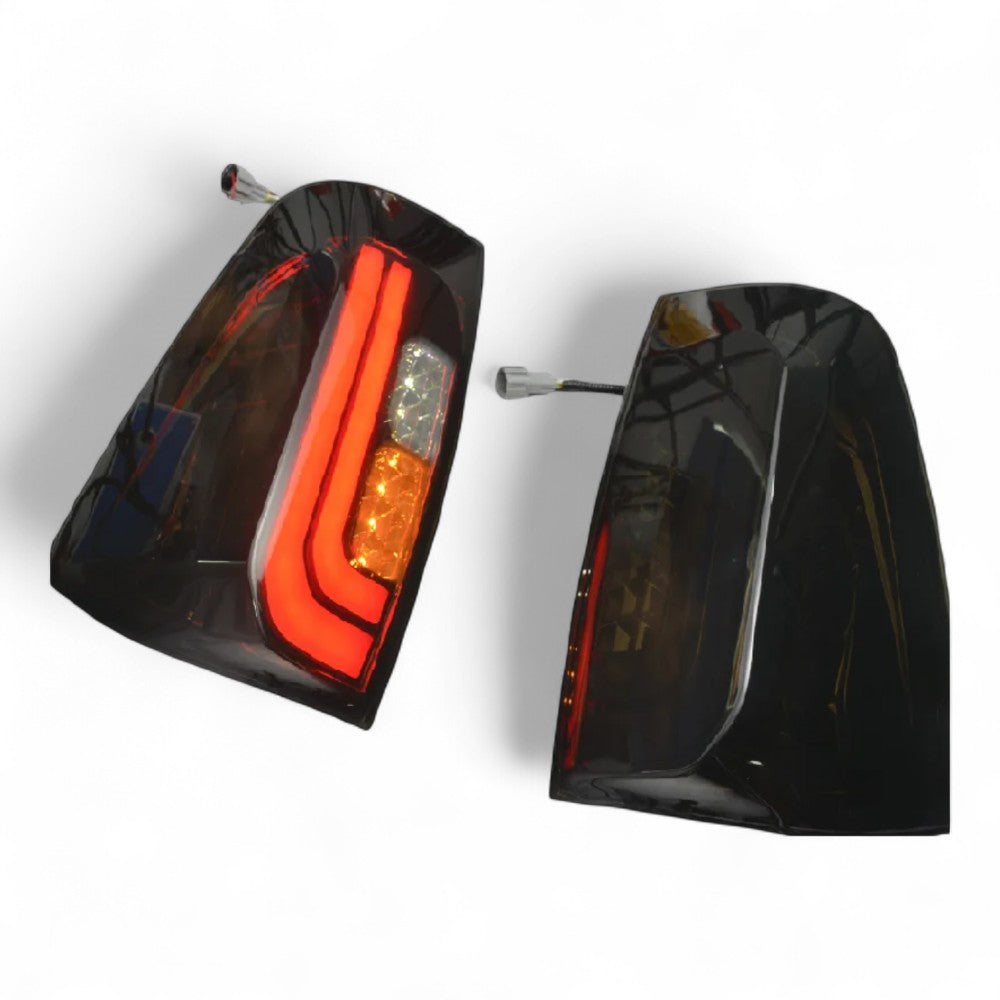 Tail Light Pair for Nissan Navara NP300 D23 2015–2020 | Smoked Black Lens - Partzo