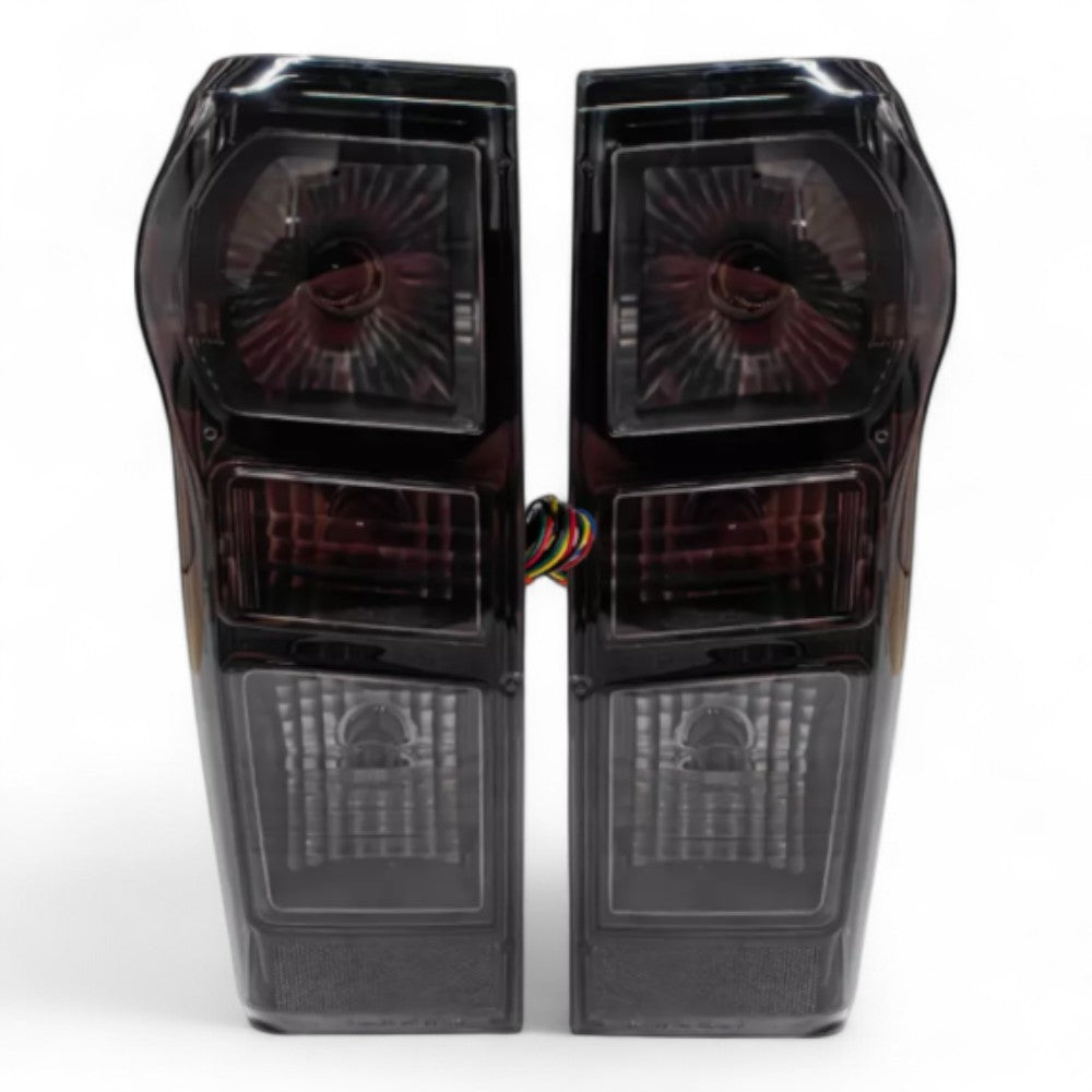 To Fit Isuzu D-MAX Tail Light 2012–2019 - Smoked Tail Light Pair