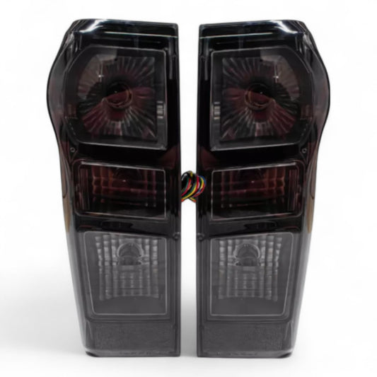 To Fit Isuzu D-MAX Tail Light 2012–2019 - Smoked Tail Light Pair